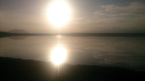 Scenic view of sunset over sea