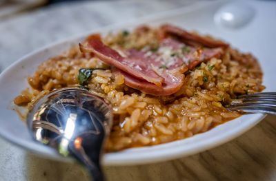 Close-up of risotto served in plate on table