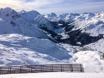 Scenic view of snow covered mountains