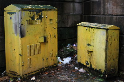 Garbage bin by metal structure