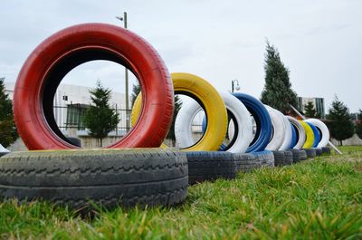 Colorful rubber tire stack in row