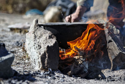 Close-up of bonfire on wood