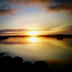 Scenic view of sunset over sea