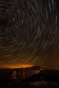 Idyllic shot of star trails at night