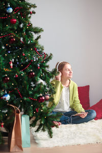 Girl with christmas tree