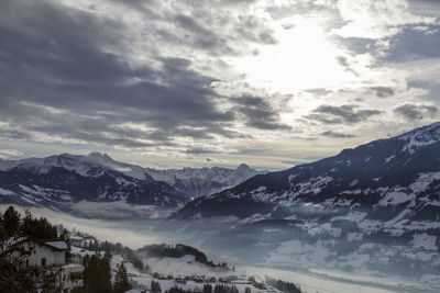 Scenic view of snow covered mountains