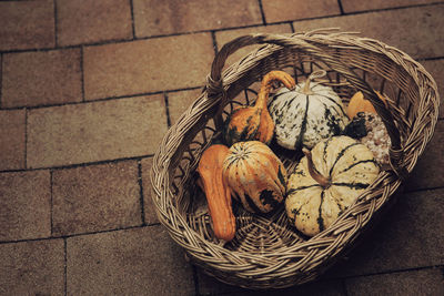 High angle view of wicker basket on floor