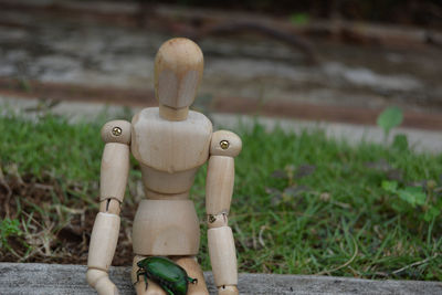 Close-up of stuffed toy on field