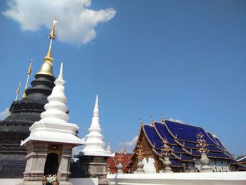 Low angle view of building against blue sky