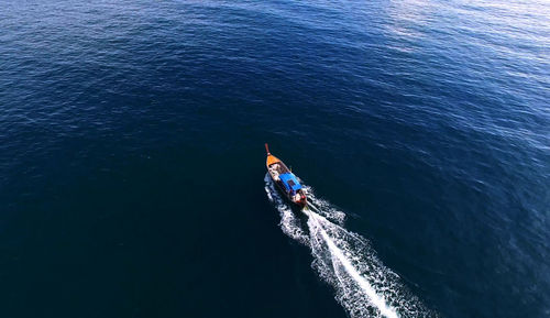 High angle view of boat sailing on sea