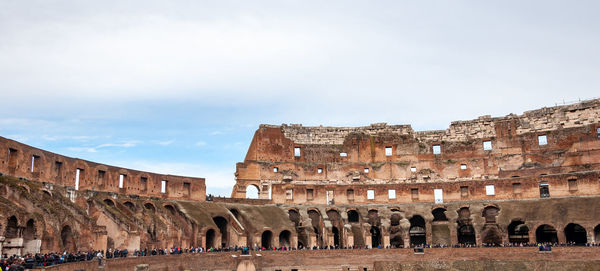 View of ruins of building against sky