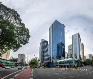 Buildings in city against sky