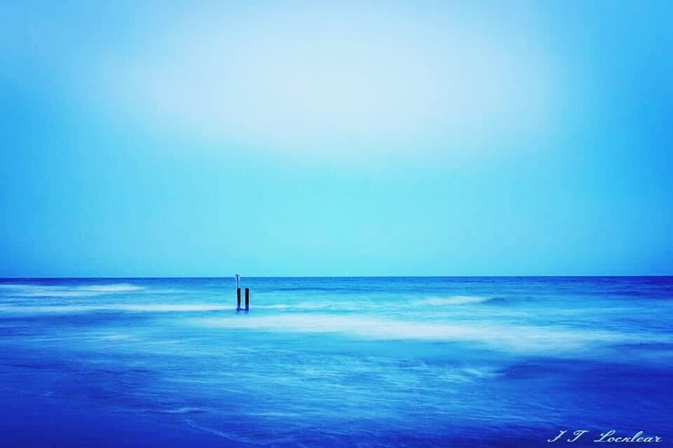 sea, water, horizon over water, blue, copy space, clear sky, tranquil scene, tranquility, scenics, beauty in nature, nature, waterfront, idyllic, beach, seascape, rippled, calm, vacations, ocean, remote