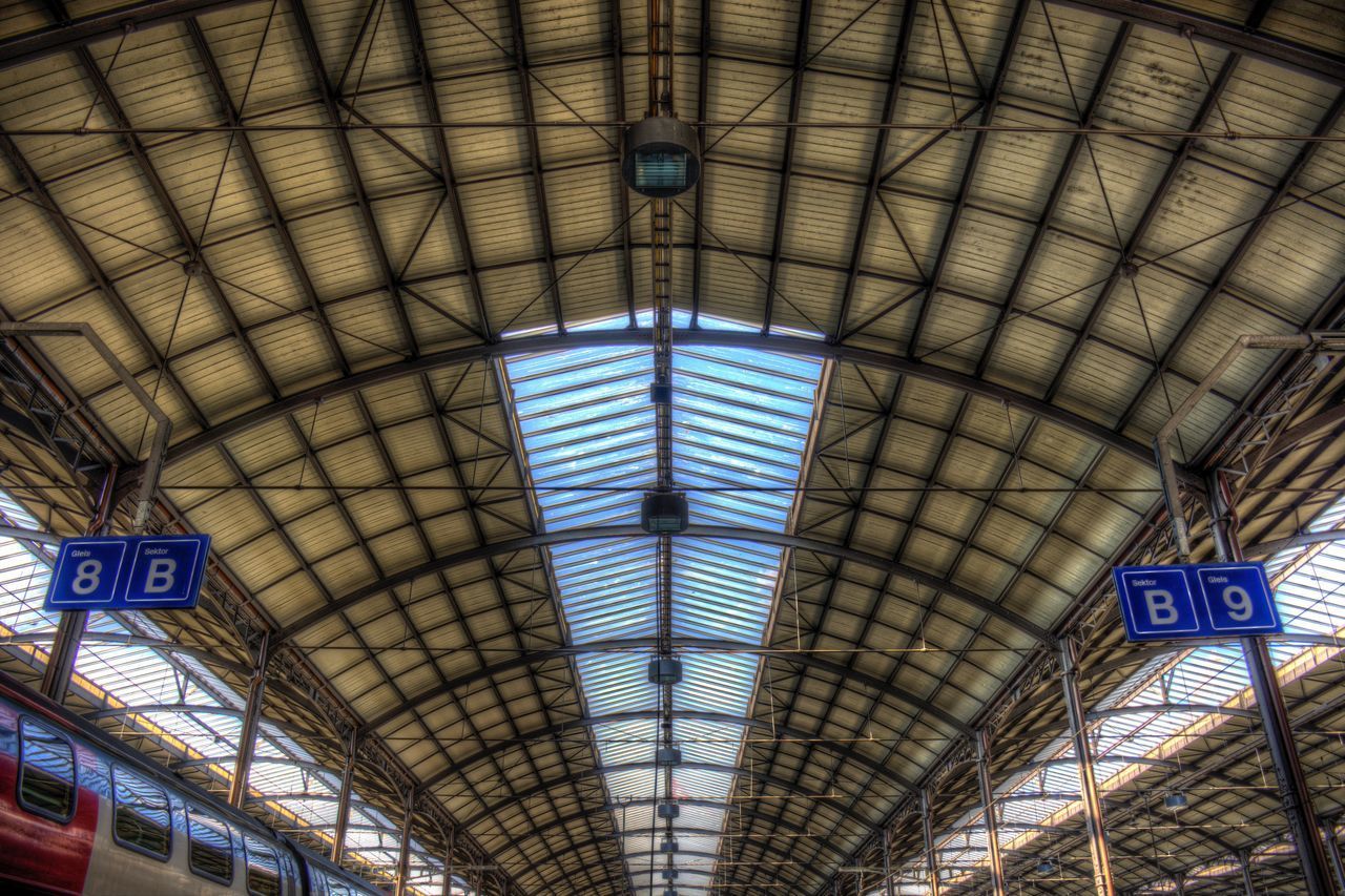 LOW ANGLE VIEW OF TEXT ON RAILROAD STATION