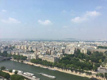 High angle view of river amidst buildings in city