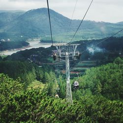 Overhead cable car over mountains