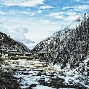 Scenic view of snow covered mountains