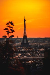 Silhouette of city during sunset