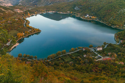 High angle view of lake amidst trees during autumn