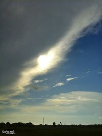 Low angle view of silhouette landscape against sky