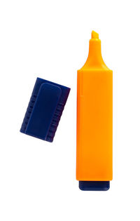 Close-up of yellow bottle against white background