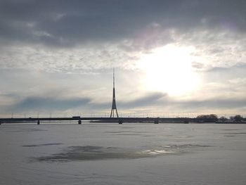 View of river against cloudy sky