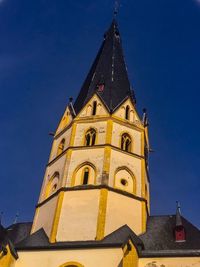 Low angle view of bell tower against clear sky