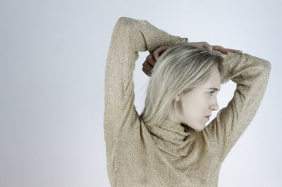 Portrait of girl against white background