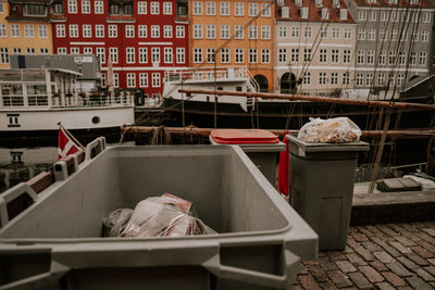 Boats moored at harbor