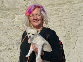 Portrait of woman with dog