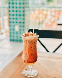 Close-up of ice cream in glass on table