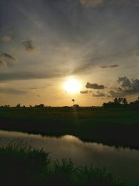 Scenic view of landscape at sunset