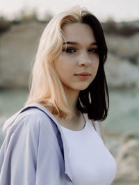 Portrait of young woman looking away