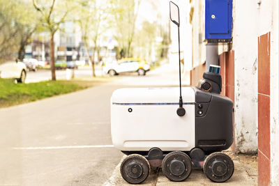 Automatic delivery robot for the transportation of goods and packages.futuristic robot electric car