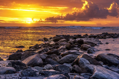 Scenic view of sea against sky during sunset