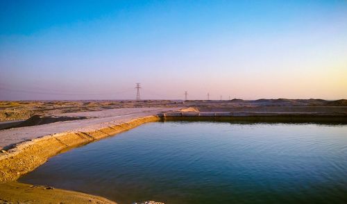 High angle view of lake against sky during sunset