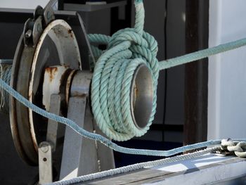 Close-up of rope tied to metal