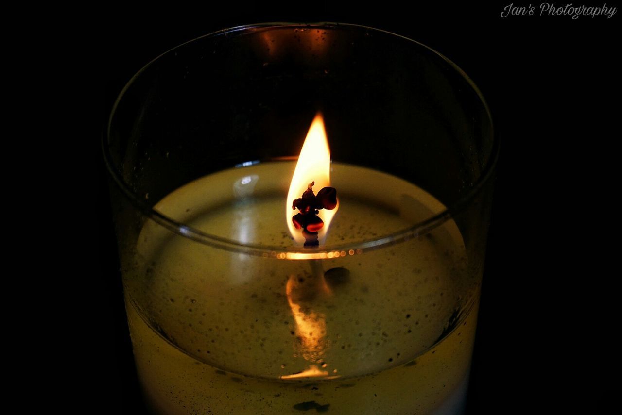 candle, fire - natural phenomenon, burning, flame, heat - temperature, indoors, close-up, glowing, candlelight, darkroom, lit, light - natural phenomenon, fire, melting, candlestick holder, wax, scented, tea light, red, no people, heat