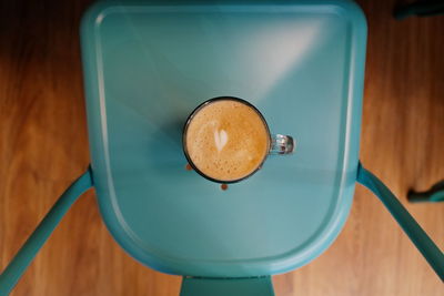 High angle view of coffee cup on table