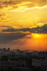 High angle view of buildings against sky during sunset