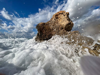 Scenic view of sea against sky during winter