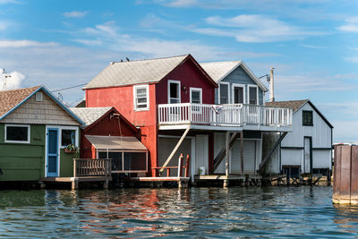 View of boat house from the water in the finger lakes.