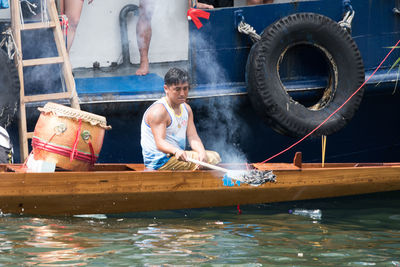 Man working in boat