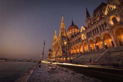 View of illuminated cathedral against sky at night