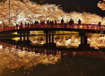 Bridge over river at night