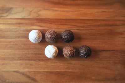 Directly above shot of chocolate truffles on table