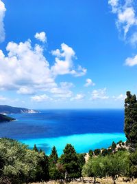 Scenic view of sea against blue sky