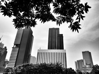 Low angle view of modern buildings against sky