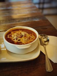 Soup in bowl on table