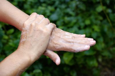 Close-up of hands washing